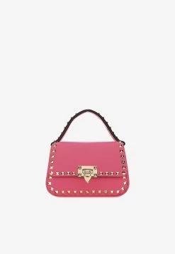 Valentino Small Rockstud Top Handle Bag In Grained Leather Fuchsia
