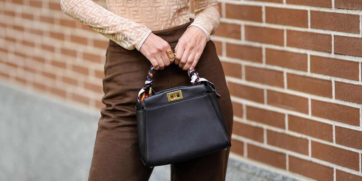 Cheap TOP-HANDLE-BAGS Store -Cheap TOP-HANDLE-BAGS Store guest wears a beige ff monogram print pattern tulle long news photo 1694113716
